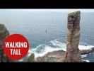 Daredevil walks tightrope from on of Britain's tallest sea stacks