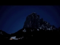 Timelapse of  a night time view of the Sasslong Mountain.